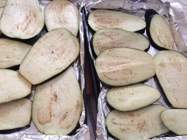 sliced eggplants about to be baked in the oven for easier rolling 