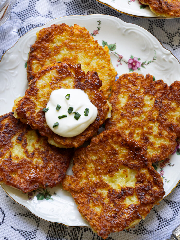 image of delicious potato pancakes with sour cream