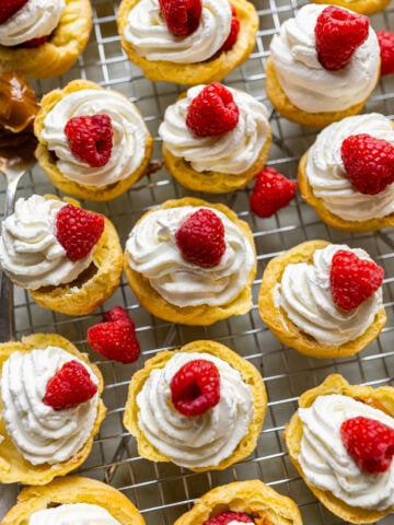 image of cream puffs with raspberries and Chantilly cream