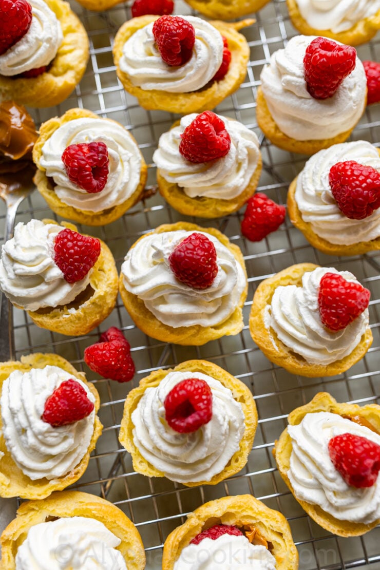 image of cream puffs with raspberries and Chantilly cream