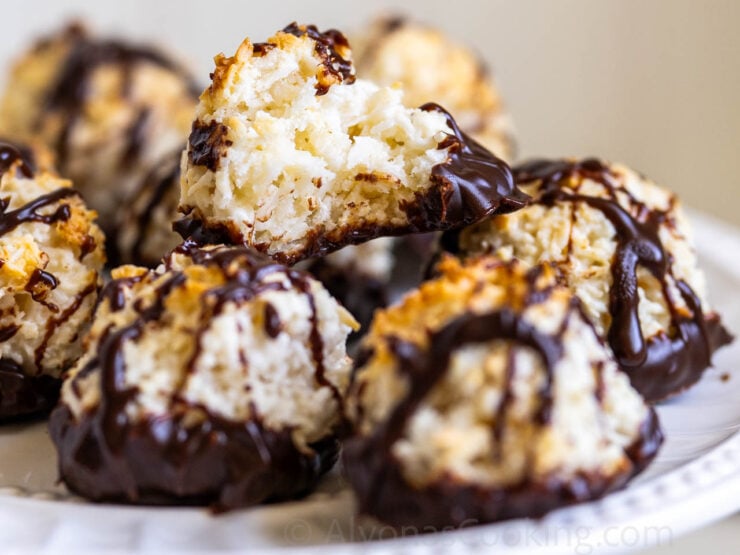 inside of a coconut macaroon cookie dipped in chocolate