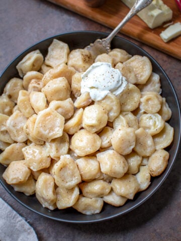 pelmeni dumplings with sour cream
