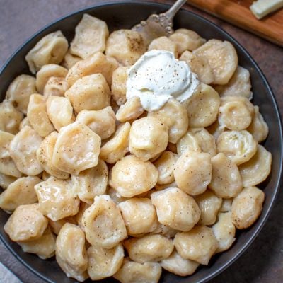 pelmeni dumplings with sour cream