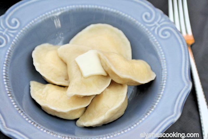 cheese filled boiled Vareniki garnished with butter