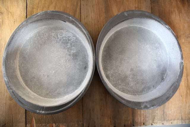 Greased and floured cake pans