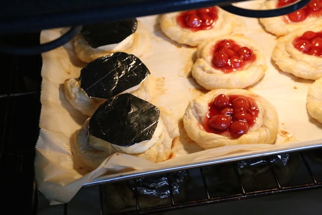 baking cheese Danishes Baking Cheese Danishes with a little pouch of foil to prevent browning