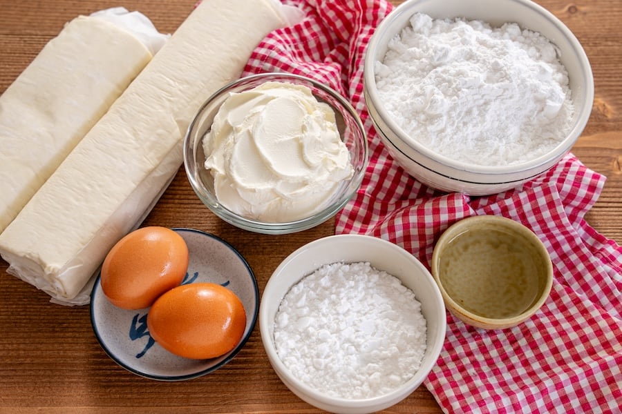 ingredients for Cheese danish ingredients for cheese Danish (puff pastry, cream cheese, powdered sugar for filling and icing, eggs, and water).