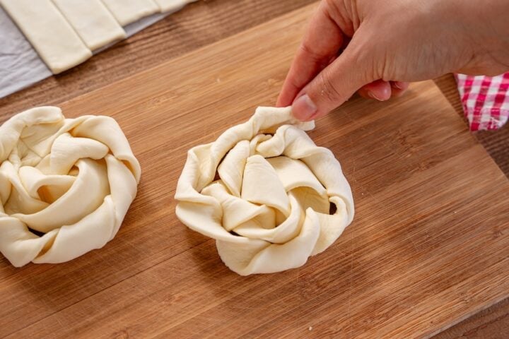 twisted rounds of puff pastry dough