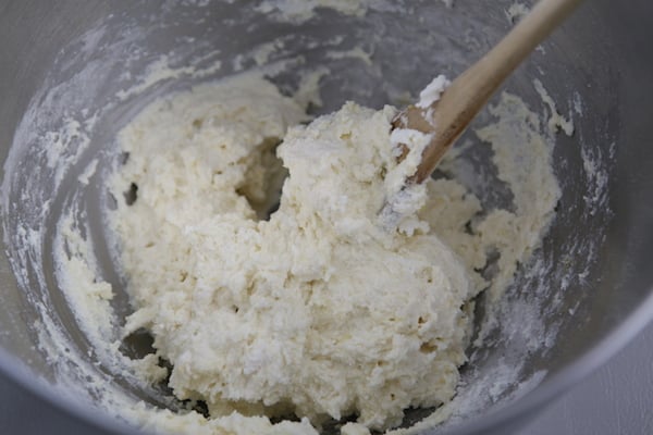 Mixing Ricotta Cheese, Egg, Salt, Baking Powder for Chebureki Dough