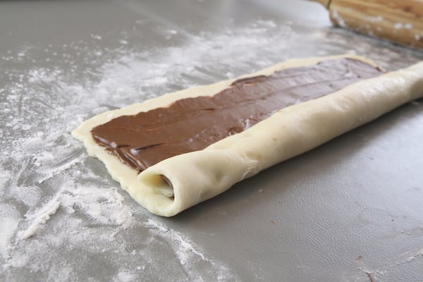 chocolate filled Rugelach that is rolled