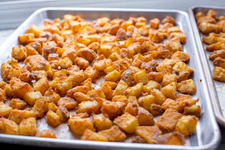 taco bells cheesy fiesta potatoes on a baking sheet baked at 475 degrees