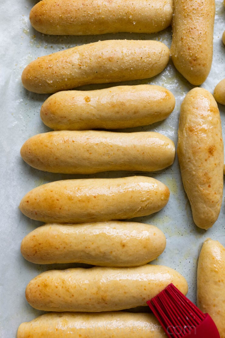 image of Olive Garden breadsticks brushed with lots of butter and sprinkled with a generous sprinkle of garlic salt