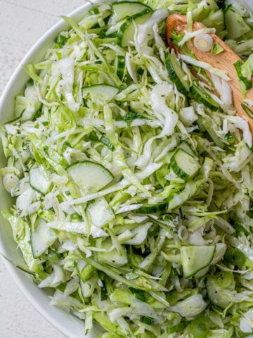 cucumber cabbage salad with green onions and sunflower oil