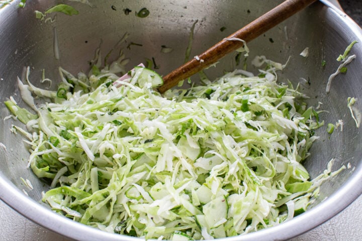 cucumber cabbage salad tossed together