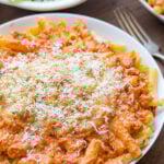 five cheese ziti al forno olive garden copycat on a plate with cheese blend and breadcrumbs
