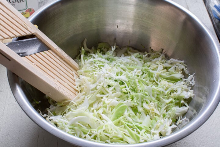 thinly shredded cabbage using a Mandoline slicer