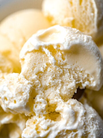 Vanilla ice cream scooped into a bowl