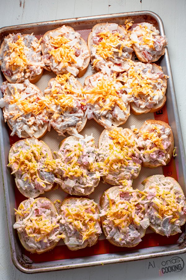 image of leftover turkey sandwiches (open-faced sandwiches with pulled turkey, tomatoes, shredded cheese on French bread slices).