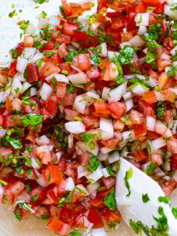 pico de gallo in a glass bowl