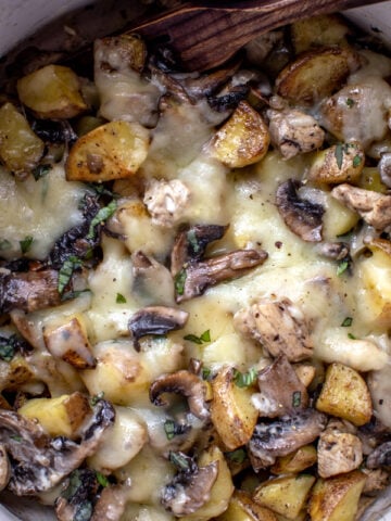 loaded potatoes with mushrooms, chicken and onion baked