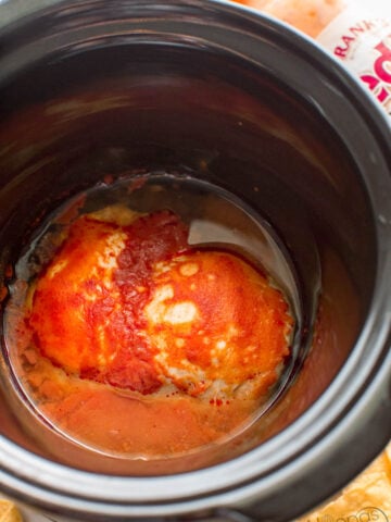 slow cooker buffalo chicken that you can use for salads, sandwiches, dips, and more.