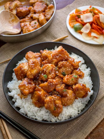 General Tso Chicken recipe on a plate over white rice