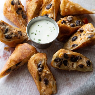 southwestern egg rolls recipe cut and served with ranch