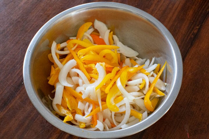 how to slice the bell peppers and onions for a chicken Philly Cheesesteak