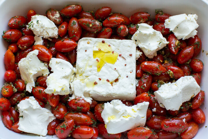 baked feta pasta with feta cheese in the middle and cream cheese