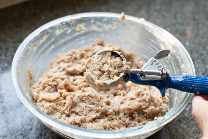 scooping and rolling meatballs