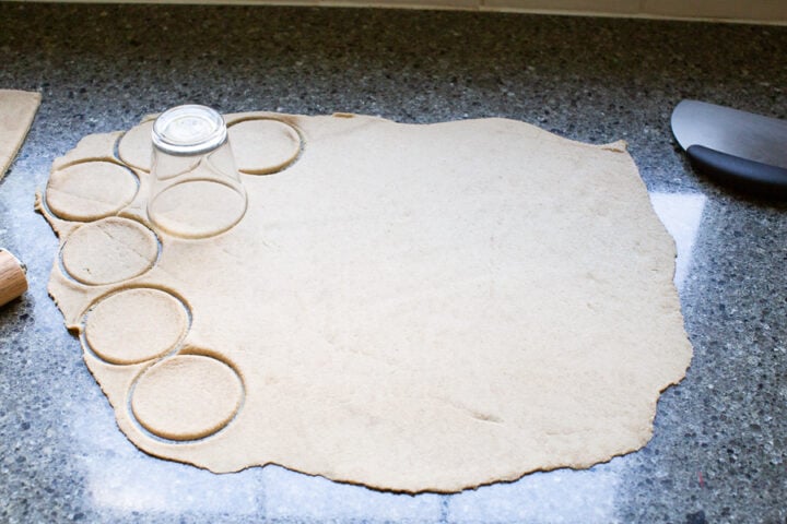 cutting out Pelmeni dough