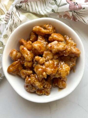 over head view of homemade Panda Express Orange Chicken in a white bowl