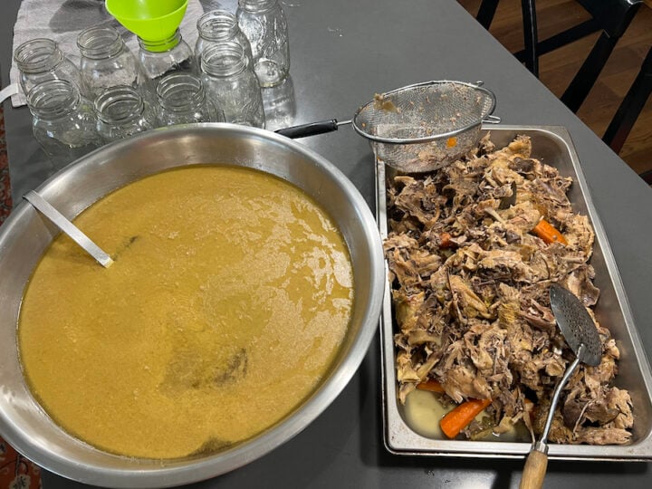 strained off chicken broth from bones and solids