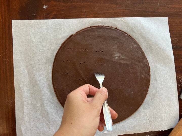 pricking cake layers with a fork