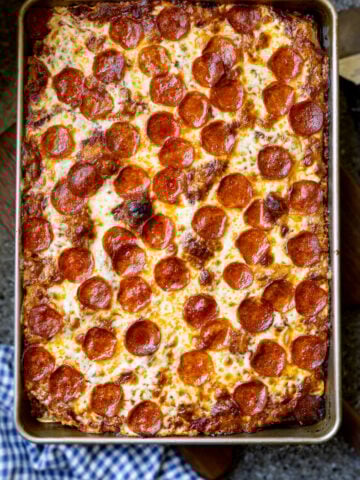 whole wheat sourdough focaccia pizza also known as Sicilian pizza with a thick rectangular crust