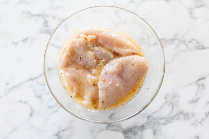 marinating chicken breasts in Italian dressing for Parmesan crusted chicken