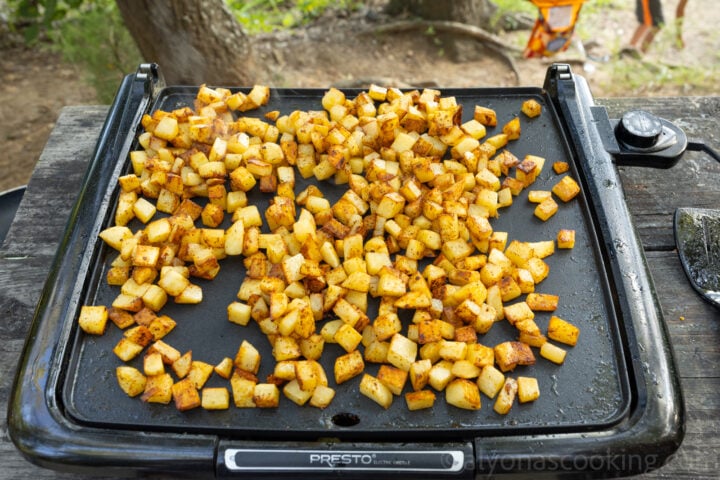image of how to cook breakfast potatoes on an electric griddle outdoors