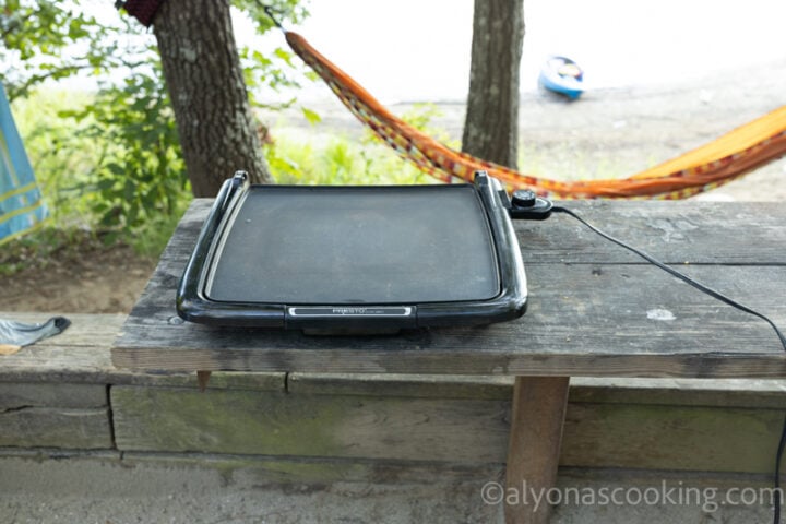 image of pre-heating an electric Presto griddle for breakfast potatoes