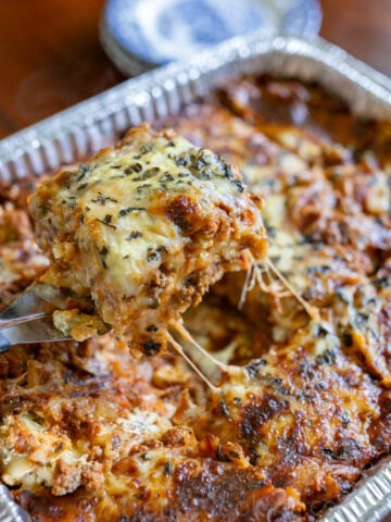 image of baked homemade freezer lasagna in a foil disposable pan