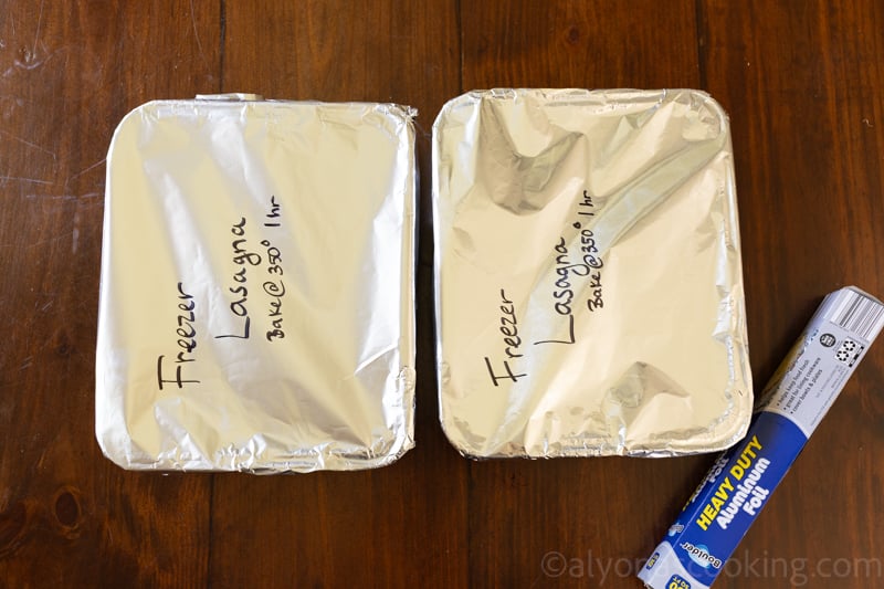 Image of cooled, assembled, and wrapped lasagna for the freezer.
