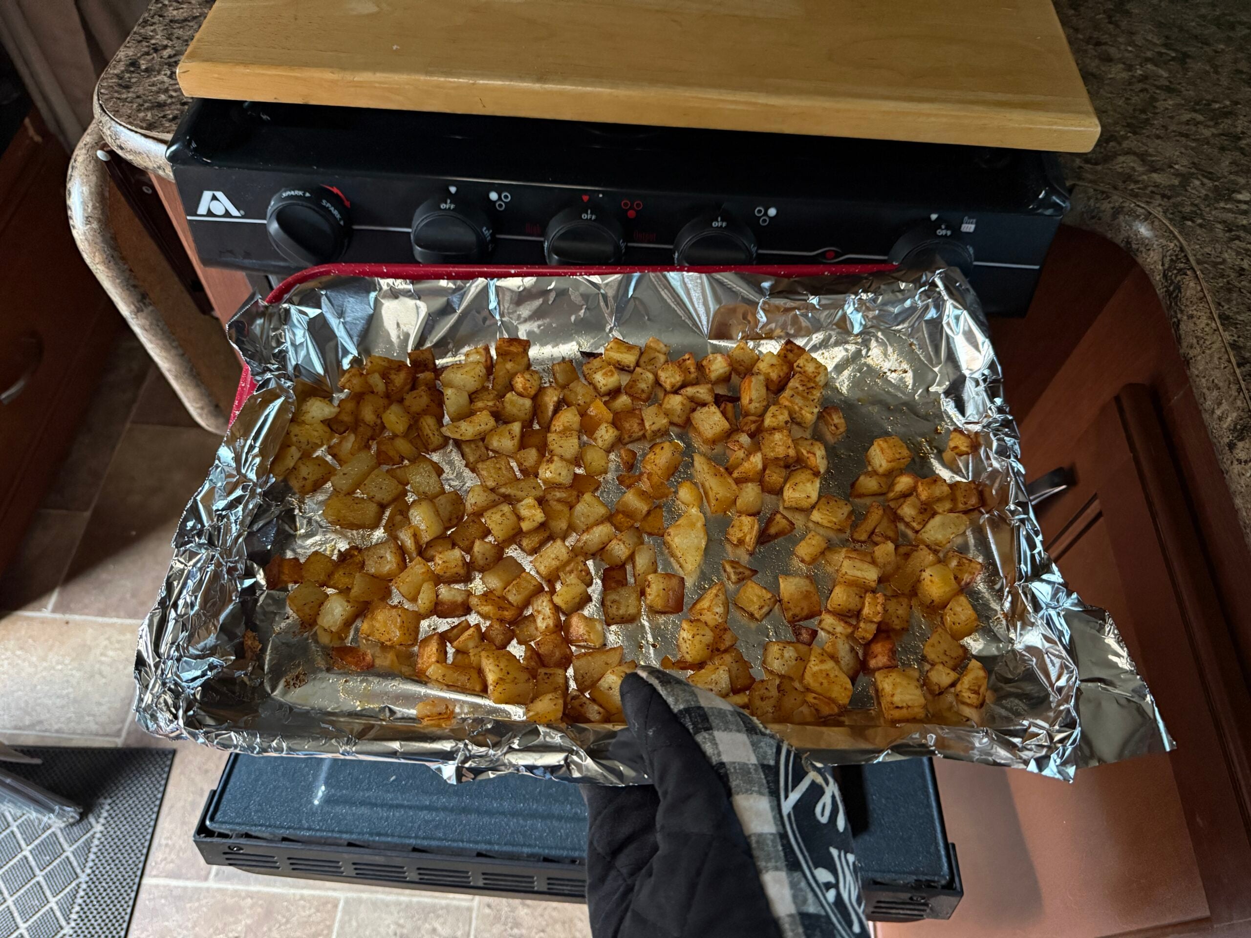 image of breakfast potatoes in an RV oven for camping