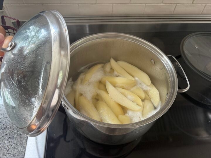 image of parboiling potato wedges for heavy cream potatoes
