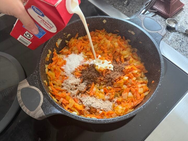 image of sautéed carrots and onions with mushroom bouillon cubes and heavy cream