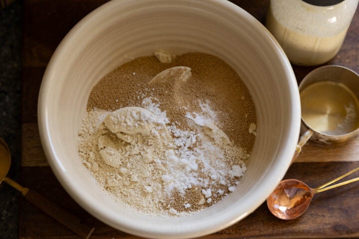 image of the dry pancake ingredients for einkorn pancakes in a vintage stoneware mixing bowl