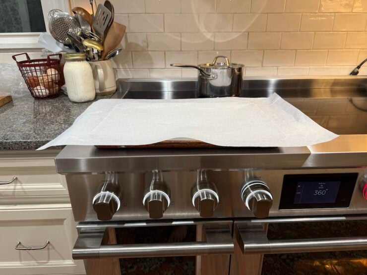 image of a prepared sheet pan lined with parchment paper for sheet pan eggs