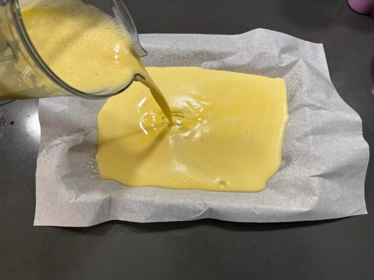 image of blended eggs being poured into a sheet pan