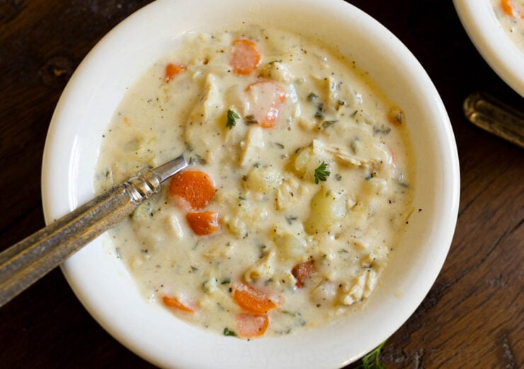 image of creamy chicken chowder soup in a bowl with vintage spoon