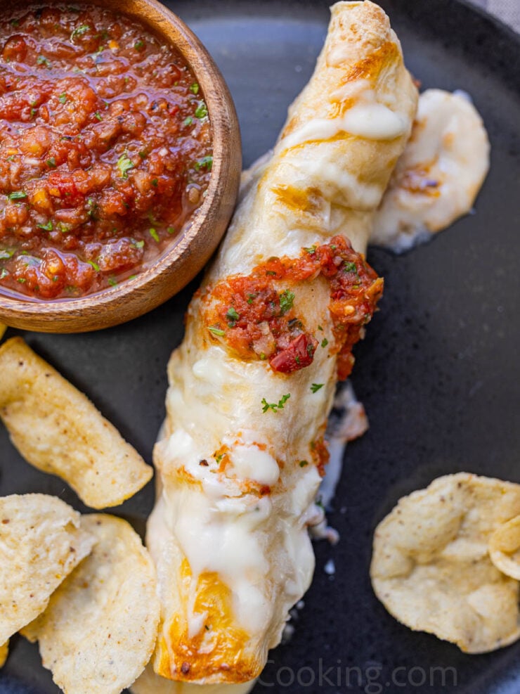 image of chicken enchiladas covered with homemade fresh salsa