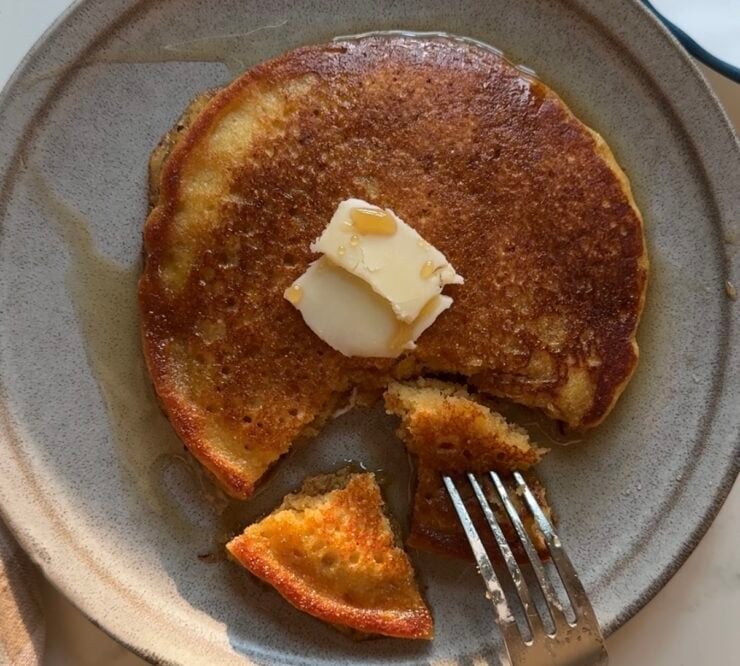image of homemade Kamut pancakes topped with butter and maple syrup