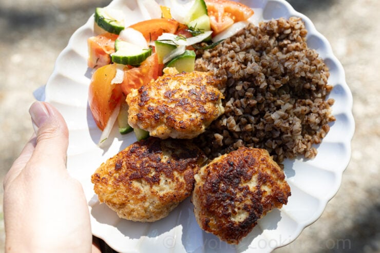 Juicy chicken kotleti served with buckwheat kasha and a cucumber tomato salad for a light Spring/Summer dish.